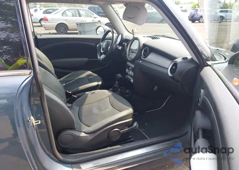 2010 Mini Cooper z USA, uszkodzony, nr VIN WMWMF3C57ATZ61622